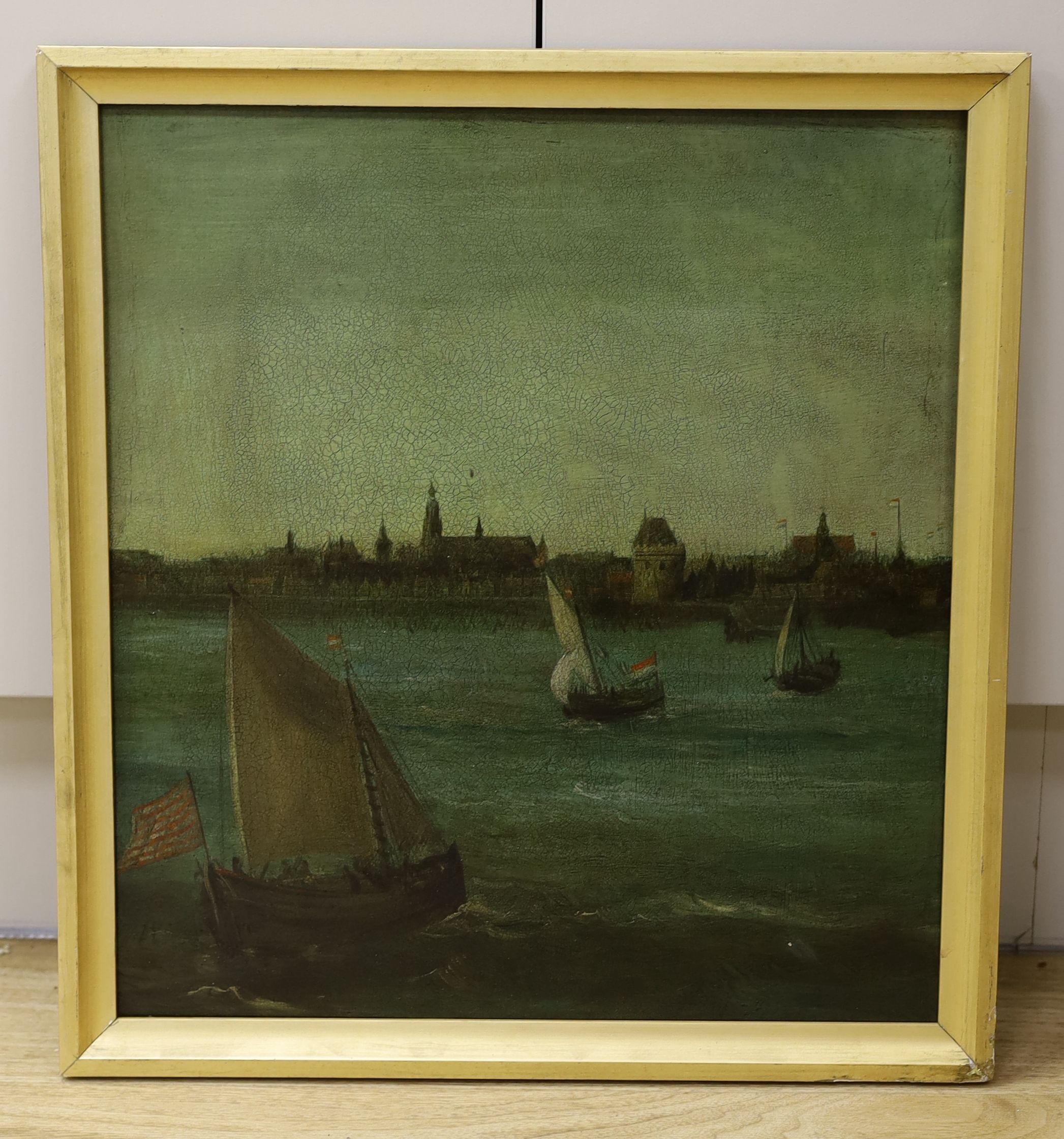 Dutch School, oil on wooden panel, Fishing boats off the coast, a town beyond, 41 x 37cm